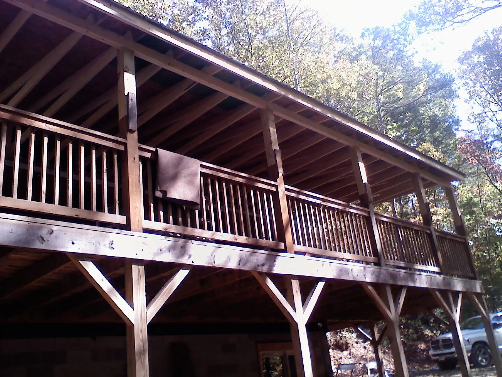Timber framing under a new elevated porch and deck — Roof Leak Repair in Aubrey by Roofing Brothers